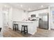 Modern kitchen with stainless steel appliances and breakfast bar at 405 Toledo St., Conway, SC 29526