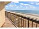 View of the beach and ocean from the unit's shaded balcony at 4111 S Ocean Blvd. # 701, North Myrtle Beach, SC 29582