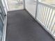 Small balcony with dark carpet and white railings at 448 Red River Ct. # 39H, Myrtle Beach, SC 29579