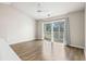 Spacious bedroom with wood flooring and access to a private balcony at 448 Red River Ct. # 39H, Myrtle Beach, SC 29579