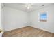 Simple bedroom with light walls and wood-look floors at 448 Red River Ct. # 39H, Myrtle Beach, SC 29579