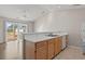 Simple kitchen with light wood cabinets and access to a balcony at 448 Red River Ct. # 39H, Myrtle Beach, SC 29579