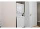 Stackable washer and dryer in a closet at 448 Red River Ct. # 39H, Myrtle Beach, SC 29579