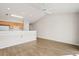 Open living space with wood floors and kitchen access at 448 Red River Ct. # 39H, Myrtle Beach, SC 29579