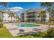 Community pool with lounge chairs and surrounding landscaping at 448 Red River Ct. # 39H, Myrtle Beach, SC 29579