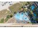 Aerial view of resort pool area with multiple pools and loungers at 4800 S Ocean Blvd. # 1007, North Myrtle Beach, SC 29582