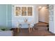 Small dining area with table and chairs, near living room at 4800 S Ocean Blvd. # 1007, North Myrtle Beach, SC 29582