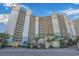 Beach Cove Resort: Oceanfront high-rise building with parking and landscaping at 4800 S Ocean Blvd. # 1007, North Myrtle Beach, SC 29582