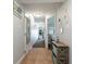 Condo hallway with tile floors and beach-themed decor at 4800 S Ocean Blvd. # 1007, North Myrtle Beach, SC 29582