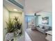 Living room with ocean view, comfy seating, and coastal art at 4800 S Ocean Blvd. # 1007, North Myrtle Beach, SC 29582