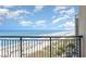 Stunning oceanfront view from balcony, showcasing beach and horizon at 4800 S Ocean Blvd. # 1007, North Myrtle Beach, SC 29582