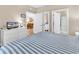 King bedroom with a view into the living room and access to the bathroom at 4882 Luster Leaf Circle # 202, Myrtle Beach, SC 29577