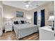 Bedroom featuring a king-size bed and updated decor at 4882 Luster Leaf Circle # 202, Myrtle Beach, SC 29577