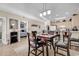 Open concept dining room with seating for six and kitchen access at 4882 Luster Leaf Circle # 202, Myrtle Beach, SC 29577