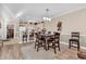 Dining area with table and chairs, hardwood floors at 4882 Luster Leaf Circle # 202, Myrtle Beach, SC 29577