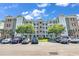 Brick building exterior with parking and landscaping at 4882 Luster Leaf Circle # 202, Myrtle Beach, SC 29577