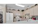 Bright kitchen with white appliances and light cabinets at 4882 Luster Leaf Circle # 202, Myrtle Beach, SC 29577