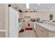 Bright kitchen with white appliances and light cabinets at 4882 Luster Leaf Circle # 202, Myrtle Beach, SC 29577