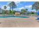 Community pool with plenty of lounge chairs at 4882 Luster Leaf Circle # 202, Myrtle Beach, SC 29577