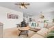 Living Room with L-shaped sofa, coffee table, and view to kitchen at 556 Affinity Dr., Myrtle Beach, SC 29588