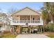 Beach home with spacious deck and carport at 6001 - 7032 S Kings Hwy., Myrtle Beach, SC 29575