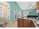Open kitchen with island, stainless steel appliances, and wood cabinets at 6001 - 7032 S Kings Hwy., Myrtle Beach, SC 29575