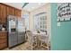 Kitchen nook with a small table and chairs, perfect for casual dining at 6001 - 7032 S Kings Hwy., Myrtle Beach, SC 29575