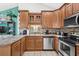 Updated kitchen with stainless steel appliances and wood cabinets at 6001 - 7032 S Kings Hwy., Myrtle Beach, SC 29575