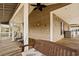 Spacious porch with swing and ceiling fan at 6001 - 7032 S Kings Hwy., Myrtle Beach, SC 29575