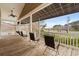 Relaxing porch with wooden chairs and view at 6001 - 7032 S Kings Hwy., Myrtle Beach, SC 29575
