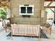 Covered patio with seating area and chalkboard feature at 6001 - 7032 S Kings Hwy., Myrtle Beach, SC 29575