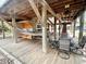 Ground level patio with outdoor seating, kitchen, and hammock at 6001 - 7032 S Kings Hwy., Myrtle Beach, SC 29575