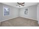 Well-lit bedroom featuring neutral decor and plush carpeting at 602 Luttie Rd., Myrtle Beach, SC 29588