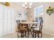 Small breakfast nook with marble top table and four chairs at 645 Lafayette Park Dr., Little River, SC 29566