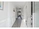 Bright and spacious entryway with gray flooring and white wainscoting at 724 Enchantment Loop, Myrtle Beach, SC 29588