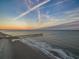 Aerial view of pier on the beach at sunset at 829 9Th Ave. S, North Myrtle Beach, SC 29582