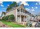 Two-story house with double garage and inviting front porch at 829 9Th Ave. S, North Myrtle Beach, SC 29582