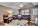 Relaxing living room with sectional sofa and ottoman at 829 9Th Ave. S, North Myrtle Beach, SC 29582