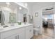 Modern bathroom with double vanity, toilet, and shower/tub combo at 838 Sandy Side Dr., Little River, SC 29566
