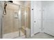 Spa-like bathroom with large shower, built-in bench, and modern fixtures at 838 Sandy Side Dr., Little River, SC 29566