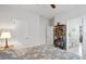 Bedroom with a queen bed, bookshelf, and en-suite bathroom at 838 Sandy Side Dr., Little River, SC 29566