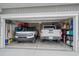 Two-car garage with ample storage space for cars and tools at 838 Sandy Side Dr., Little River, SC 29566