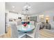 Modern kitchen with white cabinets and a blue island at 838 Sandy Side Dr., Little River, SC 29566