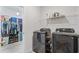 Convenient laundry room with washer, dryer, and extra storage at 838 Sandy Side Dr., Little River, SC 29566
