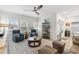 Living room with blue armchairs and a coffee table at 838 Sandy Side Dr., Little River, SC 29566