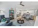 Bright living room boasts comfy seating, large TV, and open concept design at 838 Sandy Side Dr., Little River, SC 29566