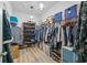 Large walk-in closet with ample shelving and hanging space for clothes at 838 Sandy Side Dr., Little River, SC 29566
