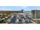Aerial view of condo building near beach and high rises at 9621 Shore Dr. # B-112, Myrtle Beach, SC 29572