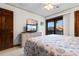 Bedroom with a TV, dresser and ocean view at 9621 Shore Dr. # B-112, Myrtle Beach, SC 29572