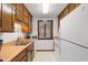 Full view of condo kitchen with white appliances at 9621 Shore Dr. # B-112, Myrtle Beach, SC 29572